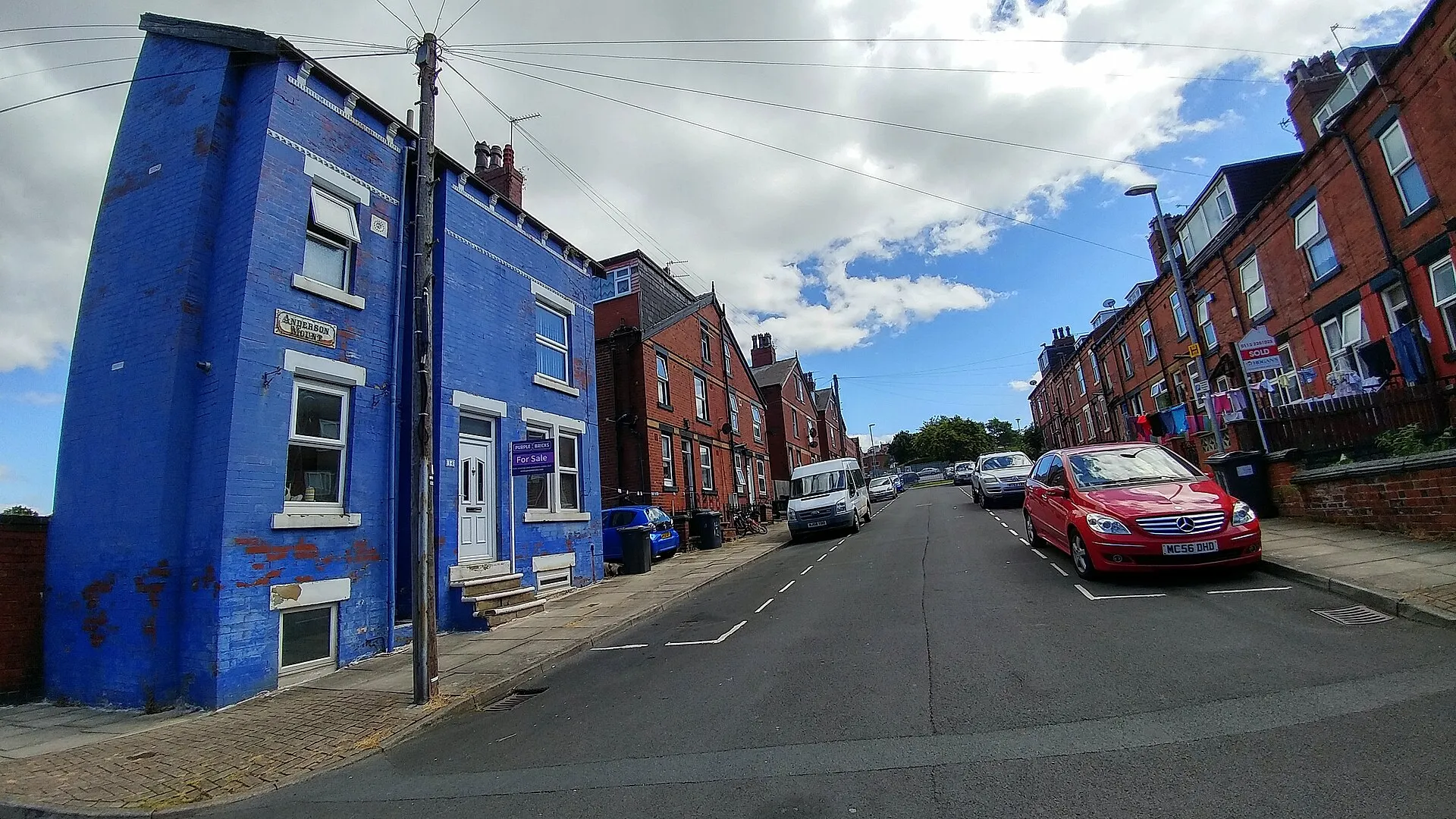 Back-to-back terraced houses on a street in Harehills, Leeds, inside a selective licensing area